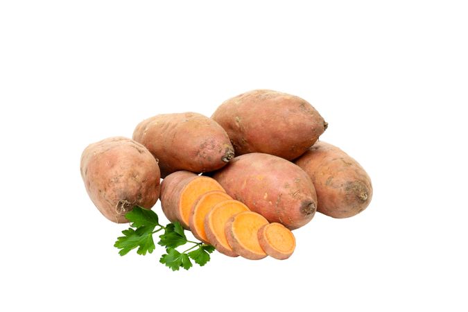 Sweet potato roots, isolated on blank background