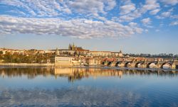 Prague skyline and water reflection