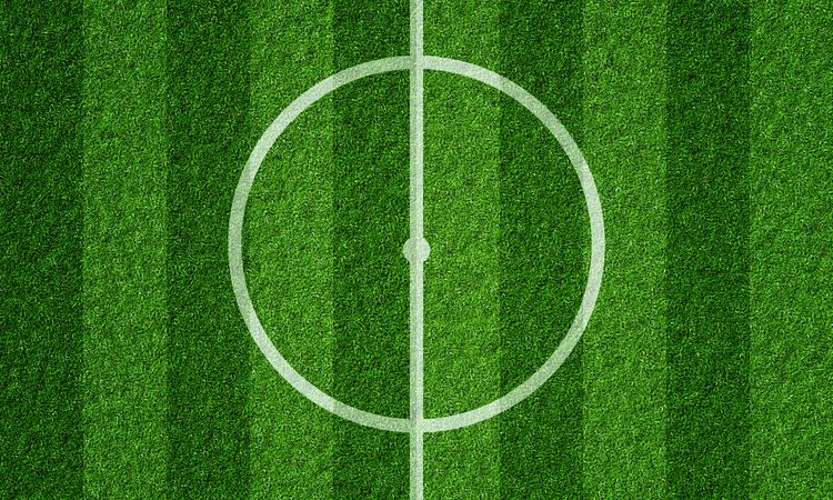 Top view of soccer field with grass lines