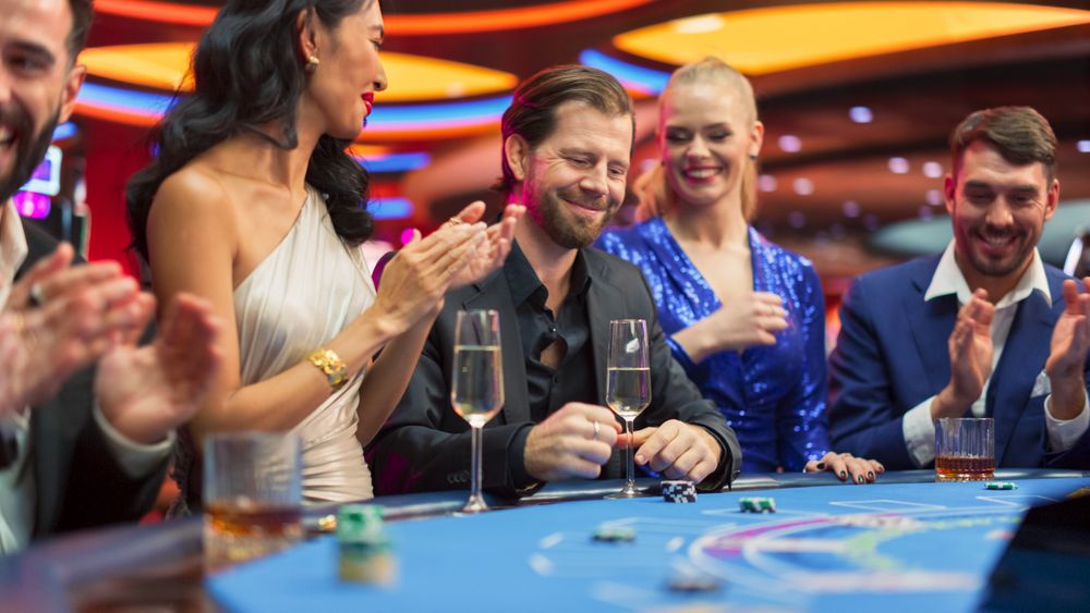 Portrait of a Newly Rich Man Winning at a Table Card Game in a Modern Casino.