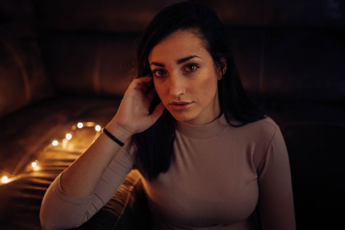 young woman with background lights