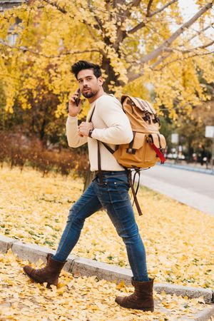 Stylish male talking on mobile phone