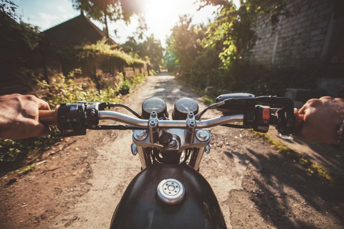 POV shot of young man riding on a motorcycle