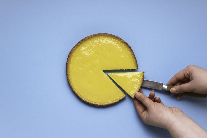 Serving a single piece of lemon tart