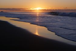 Colorful sunset over peaceful seashore