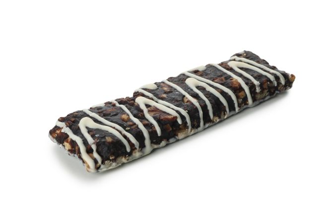 Tasty granola bar isolated on blank background