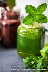 Close up of green smoothie with mint leaves 4myVQ4
