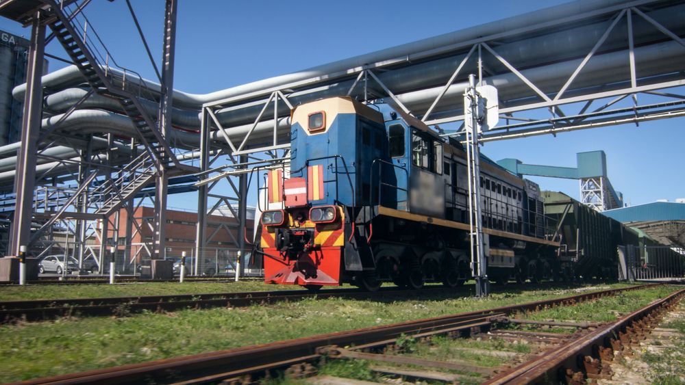 Industrial Diesel Freight Train in Railway Station