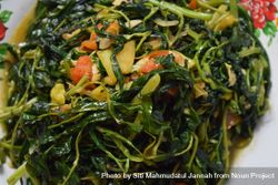 Top view of plate of cooked vegetable side dish 4NEaje