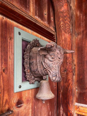 Cow bell knocker in Rossiniere, VD