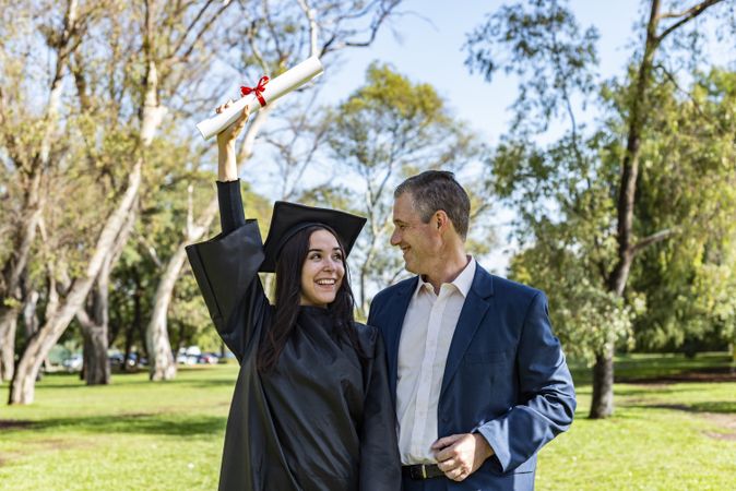 Happy graduate with her father on her graduation