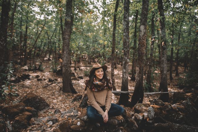 Young woman relaxing in forest