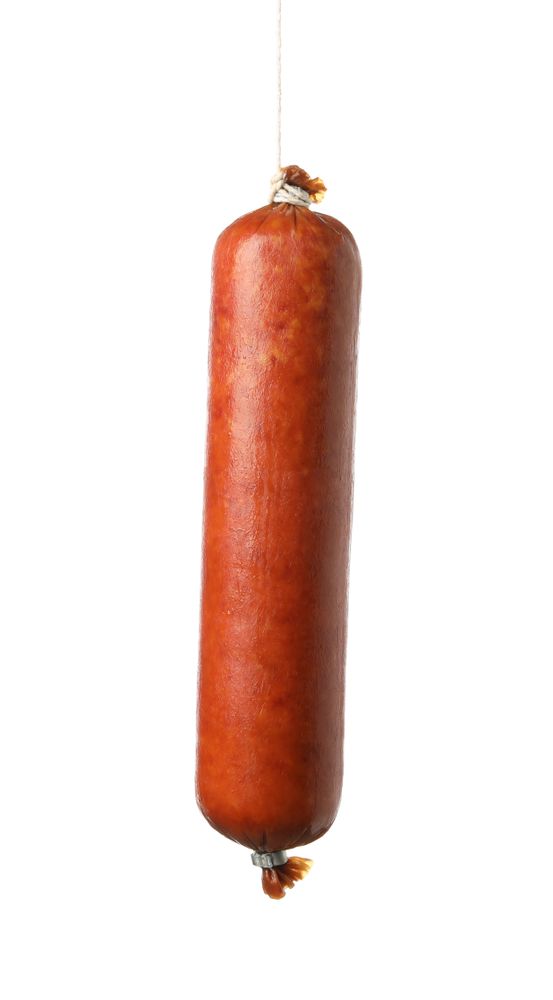 Encased meat hanging on string on blank background
