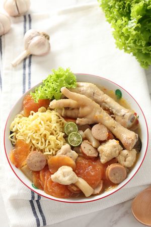 Close Up Seblak Ceker, Spicy Chicken Feet with Stew Cracker