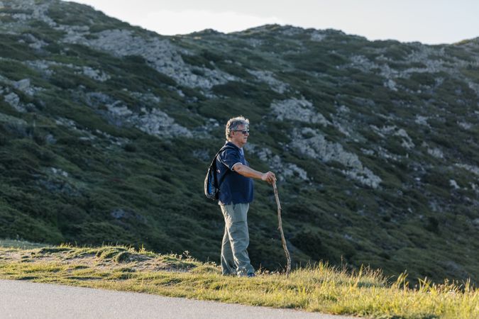 man posing on the mountain