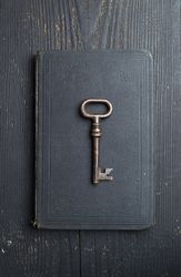 Vintage Key over dark leather book cover