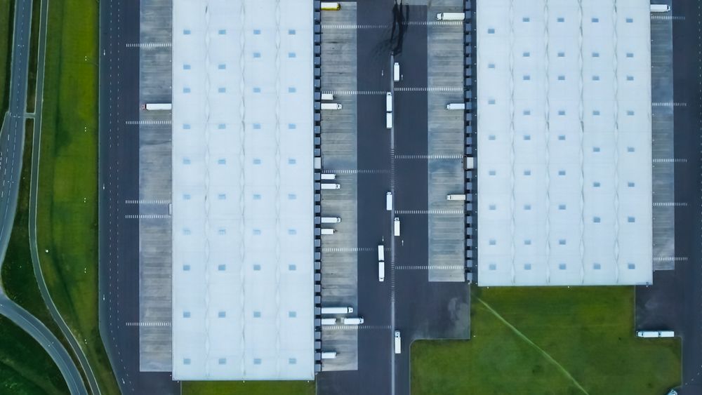 Aerial Shot of Truck with  Storage Building