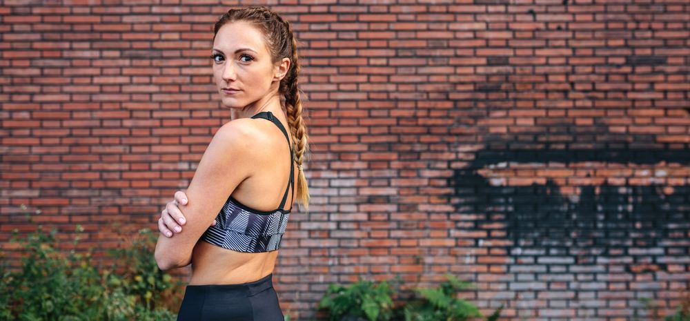 Sportswoman with boxer braids posing