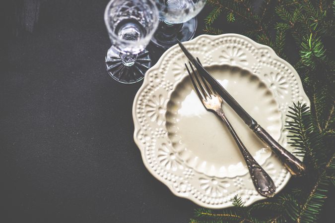 Christmas table setting with crystal wine glasses