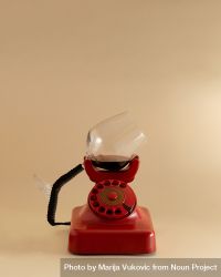 Vintage rotary phone with red wine instead of an ear piece be6L60