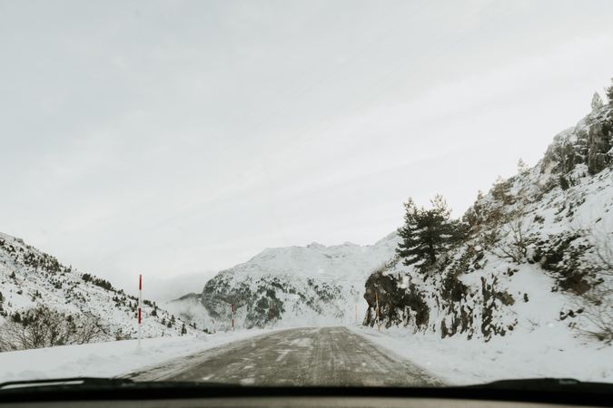 Countryside road between snow hills
