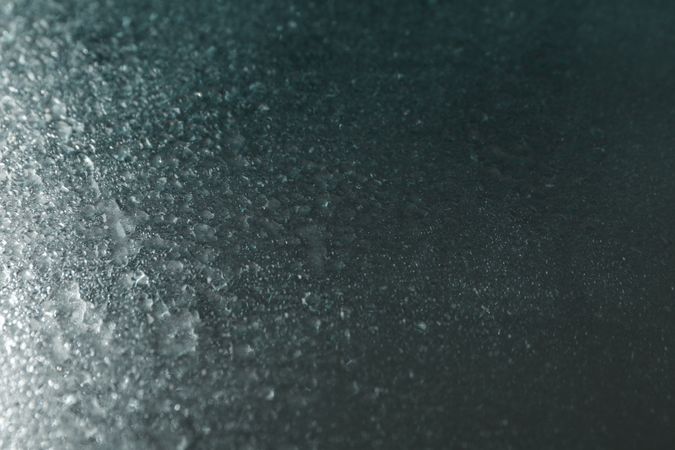 Dewy metallic blue table with droplets