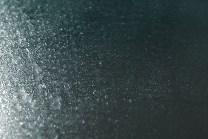 Dewy metallic blue table with droplets