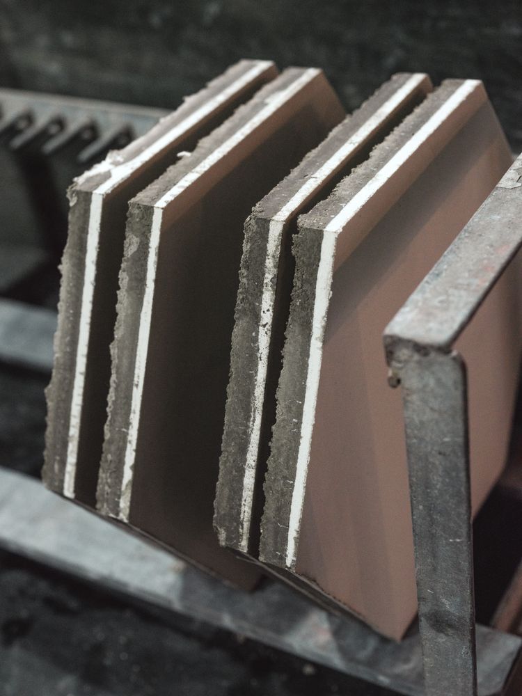 Hexagonal tiles on rack in row