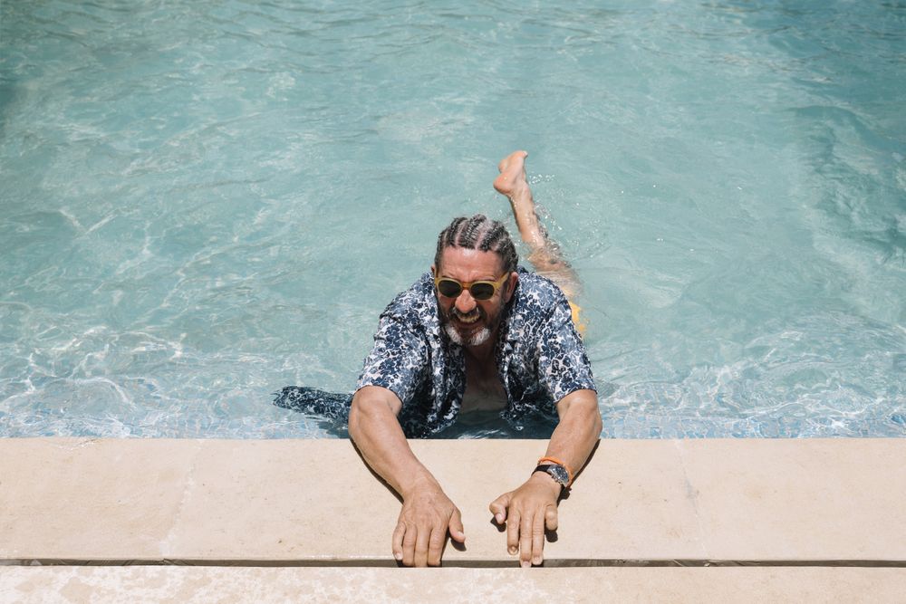 Mature man in swimming pool