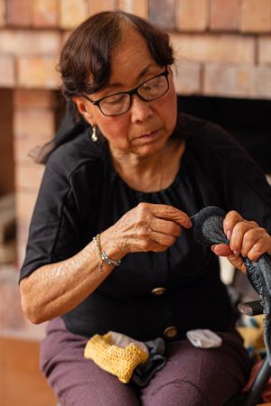 Woman weaves life's melodies