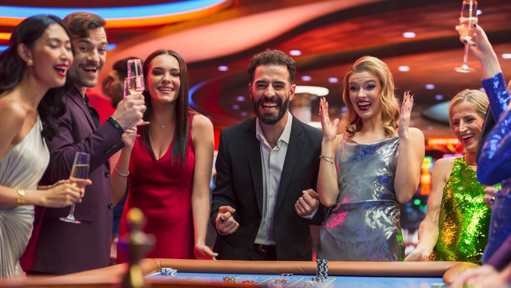 Group of Diverse Young People Gambling at a Casino.