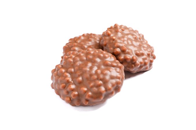 Chocolate cookies with caramel filling isolated on plain background