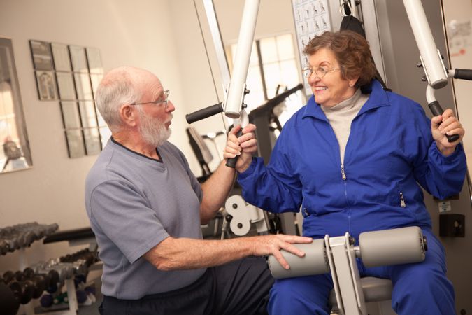 Older Adult Couple Working Out Together in the Gym