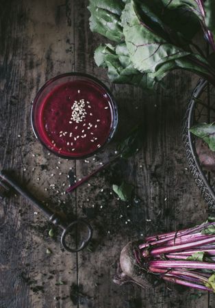 Beetroot and fresh smoothie on wooden table