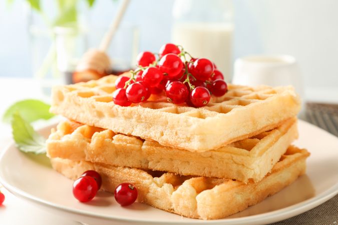 Beautiful composition with sweet belgian waffles, space for text
