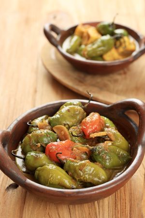 Tumis Cabe Gendot or Stir Fried Capsicum pubescens in Curry Sauce.