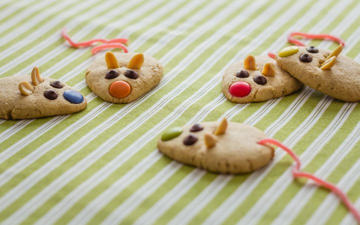 Cookies with mouse shaped and red licorice tail