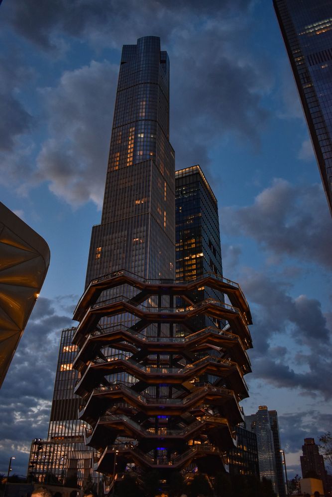 Low-angle view of skyscraper at night