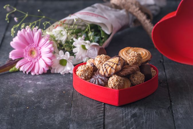 Red box with cookies and flowers