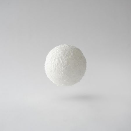 Snowball against grey background