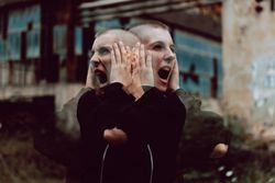 Anguished woman screaming on street