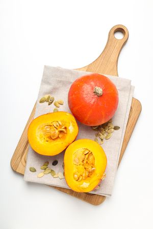 Cooking ingredients for fall season - pumpkin seeds, pumpkin