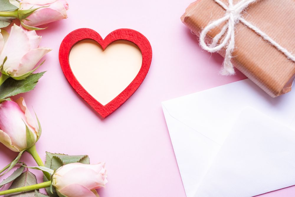 Red wooden heart and roses