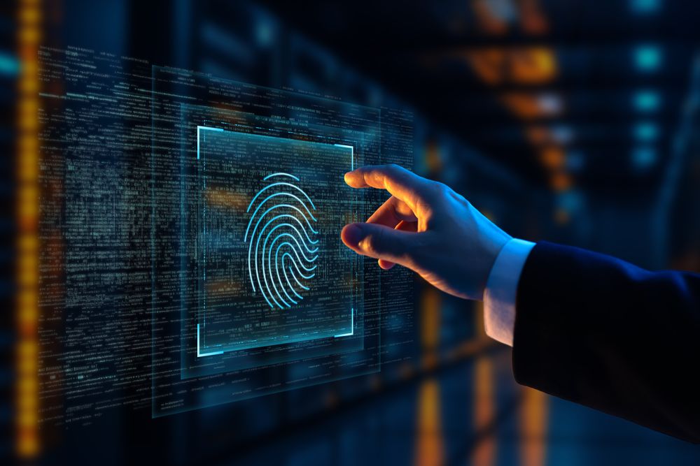 Businessman reaching hologram fingerprint cybersecurity