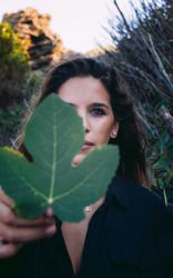 Resting female walking in nature and enjoying in leaf