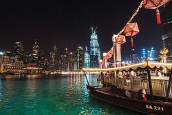 Boat and embankment in night metropolis