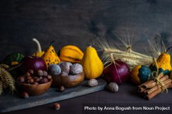 Spread of autumnal foods on wooden table 5qg1Yb