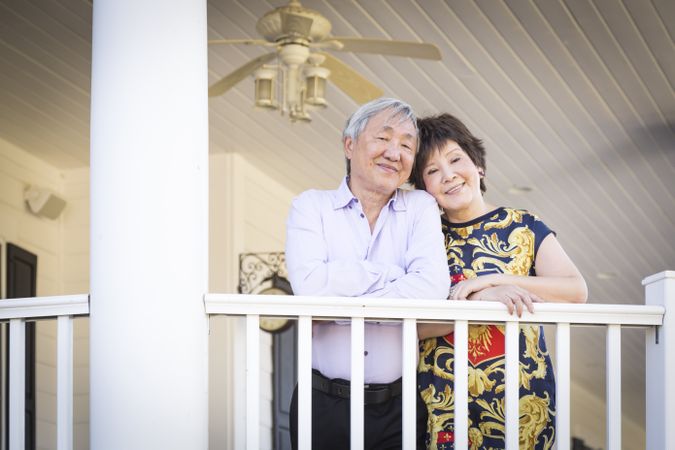 Chinese Couple Enjoying Their House