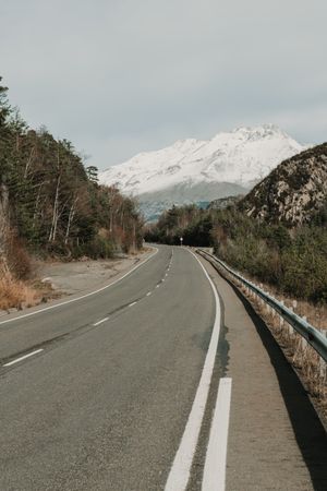 Countryside route on valley with woods and wonderful mountains