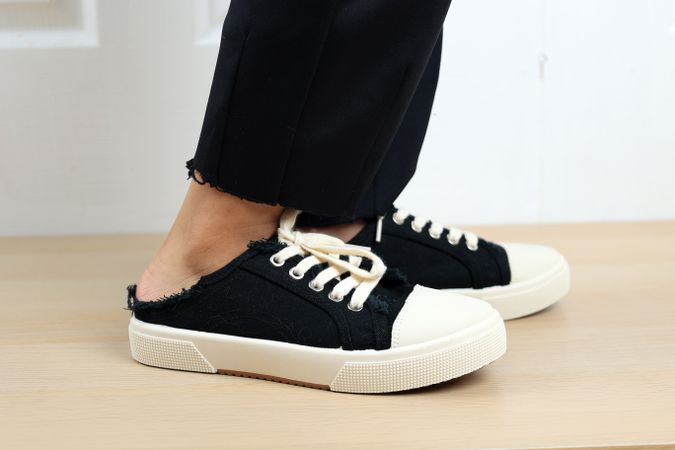 Female Feet Wearing Shoe Sneaker Slipper